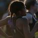 Saline freshman Autumn Godette runs with a baton on Tuesday, April 30. Daniel Brenner I AnnArbor.com